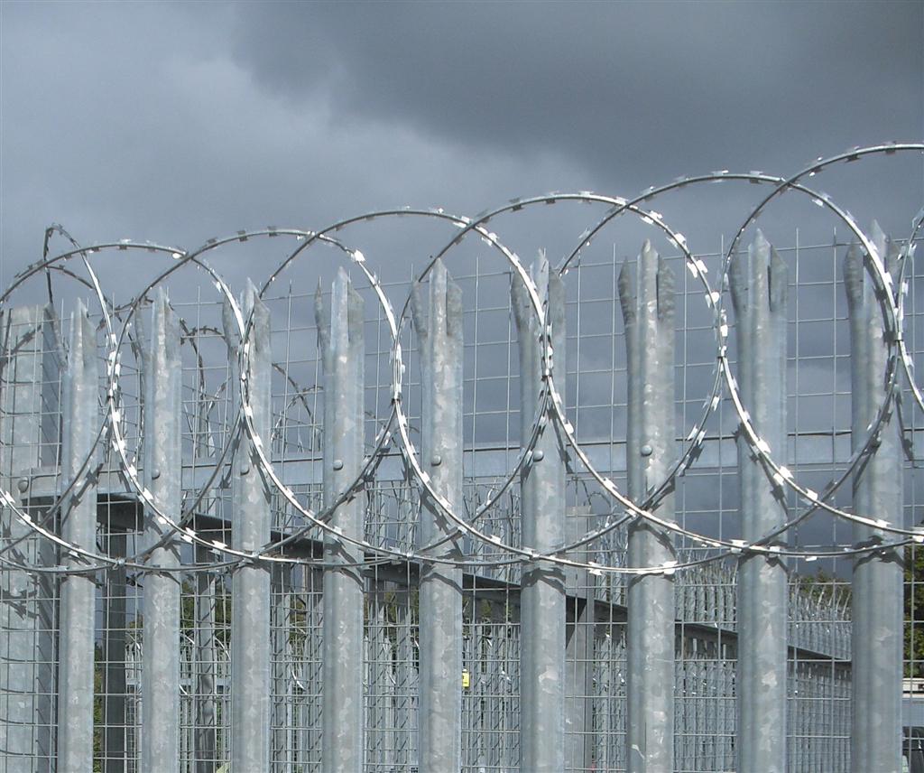 High Security steel palisade with razor wire topping