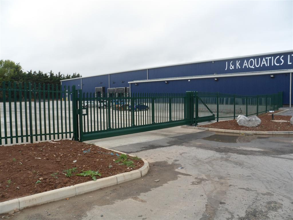 Steel palisade with matching sliding gate at business premises on Juction 24