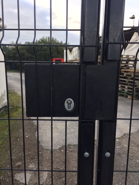 KEYED ACCESS FROM OUTSIDE WITH SHROUDED PANIC PUSH PAD